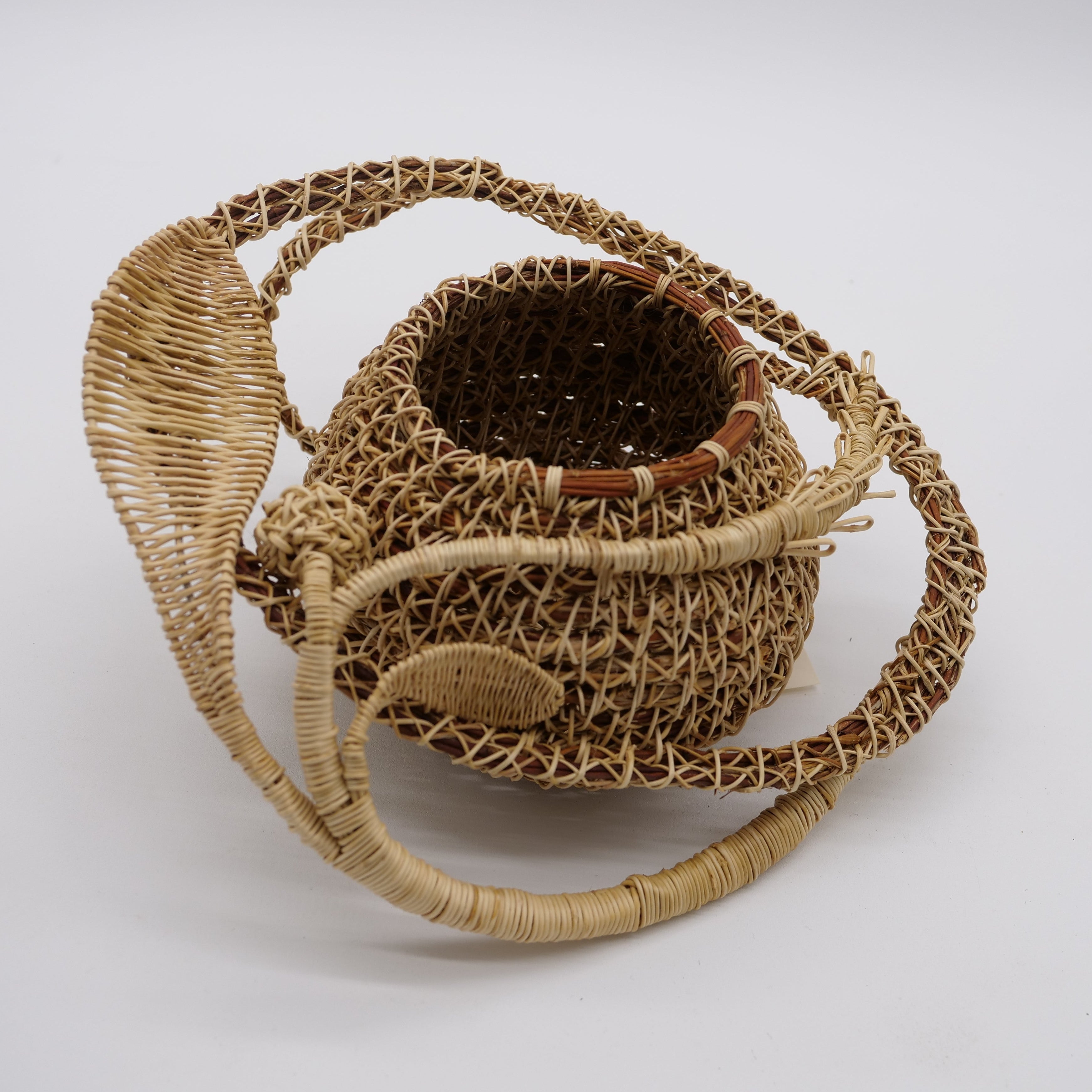 A natural woven honeysuckle basket