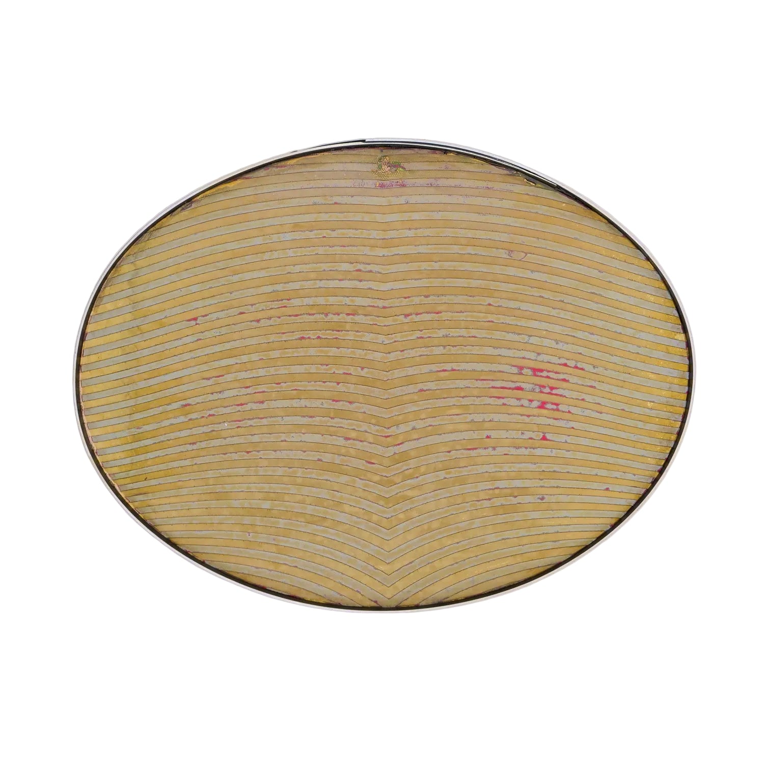 Decorative oval handmade tray with yellow and red pattern on a white background.