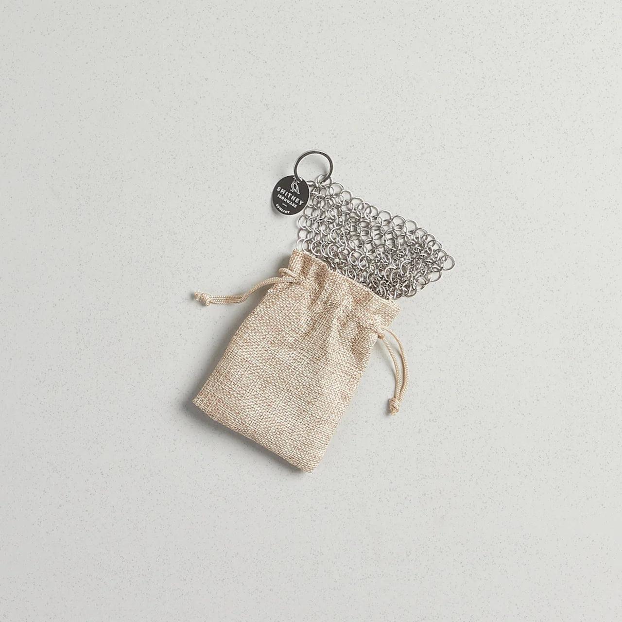 Smithey Chainmail pan scrubber in linen bag