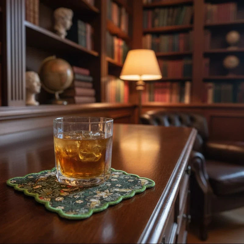 William Morris Strawberry Thief napkin holding a bourbon in a library