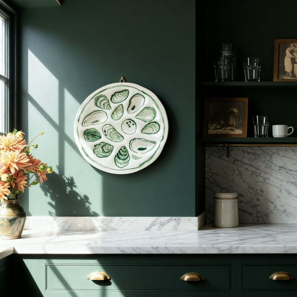 Green Bridgman Pottery Oyster Plate on wall