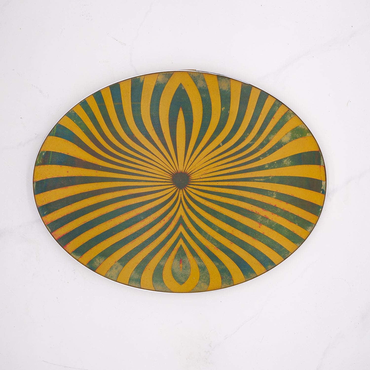 Oval Tray with green and yellow concentric pattern on a white background