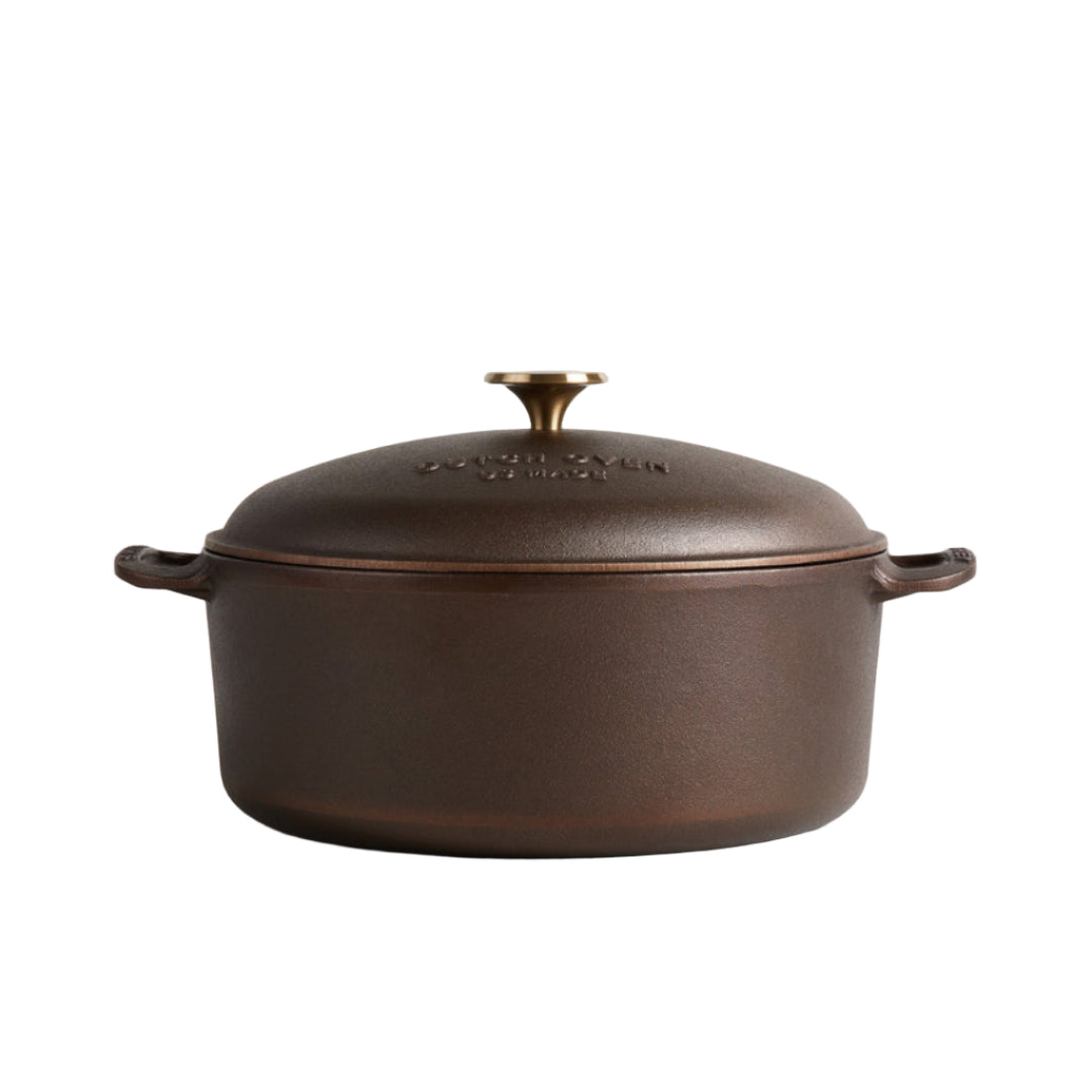 Brown cast iron dutch oven pot with lid 