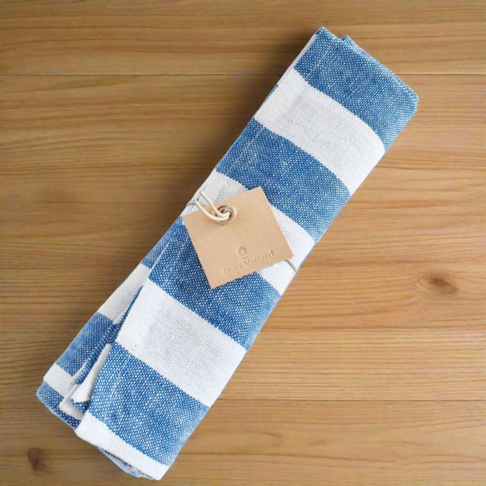 Celina Mancurti Blue Striped Napkin on Oak Countertop